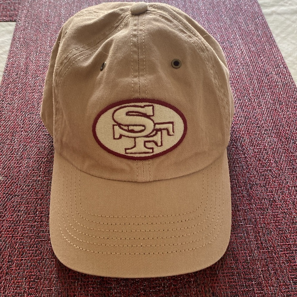 47 NFL Khaki Baseball Cap with Maroon & Cream SF Patch Adjustable Strap.